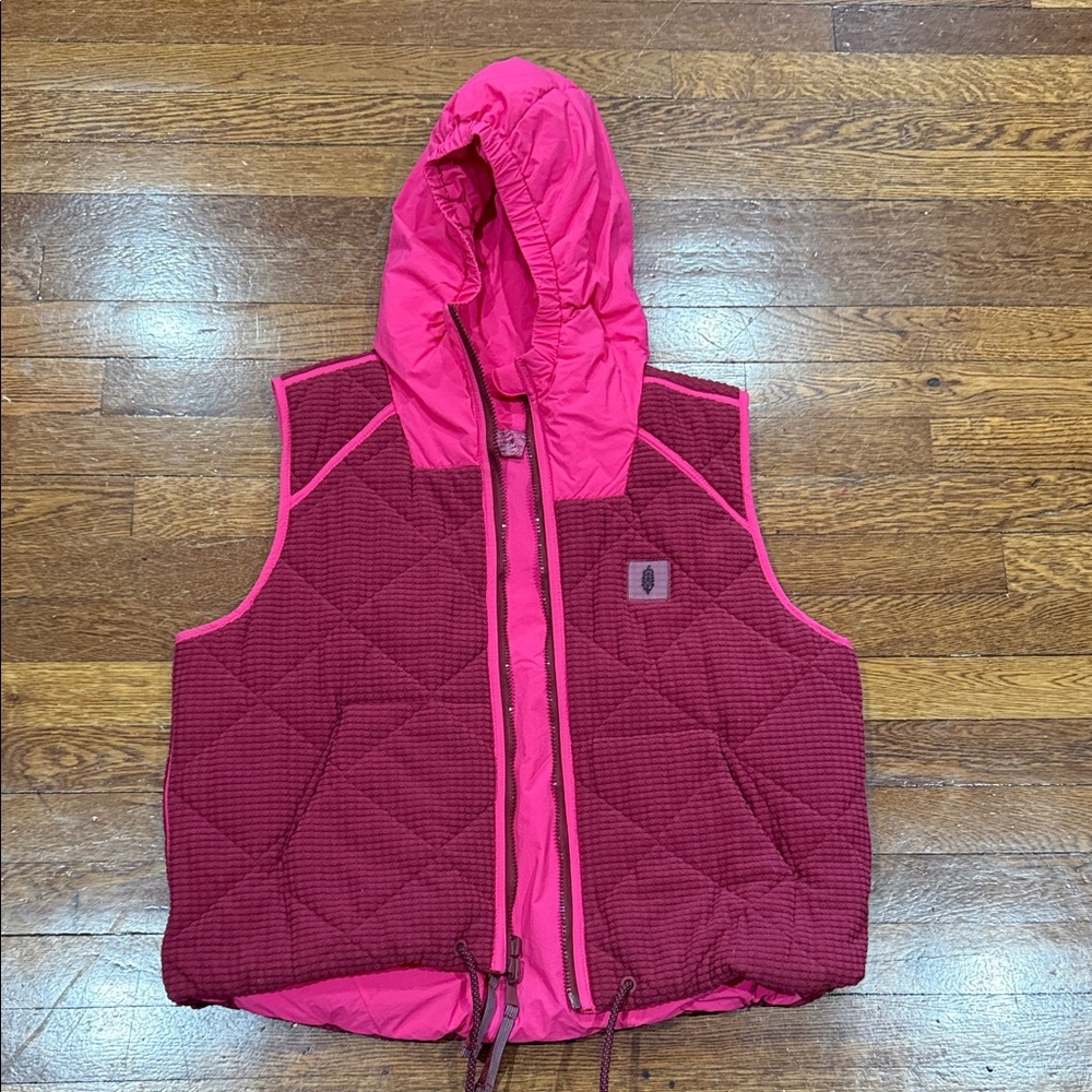 Reversible hooded vest